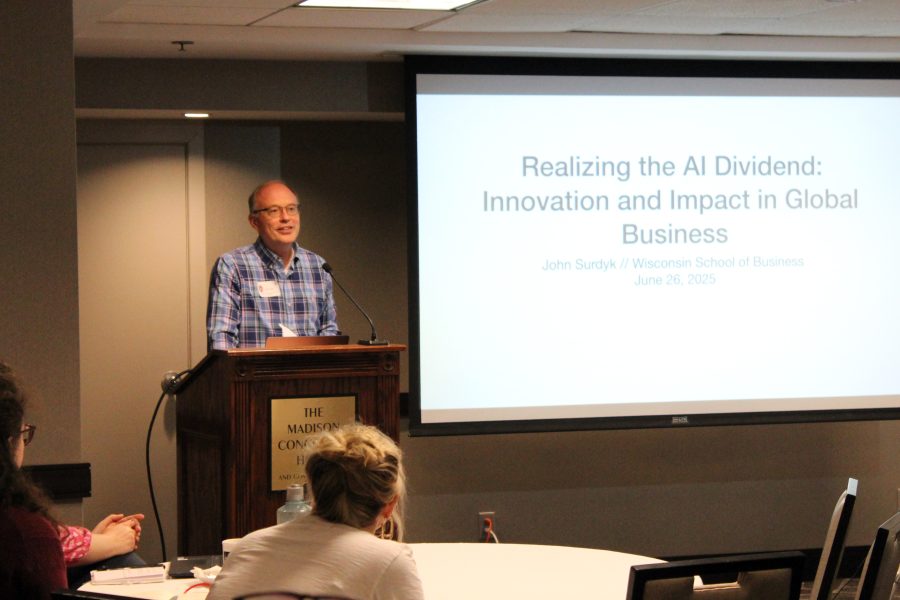 Man presenting during AI conference