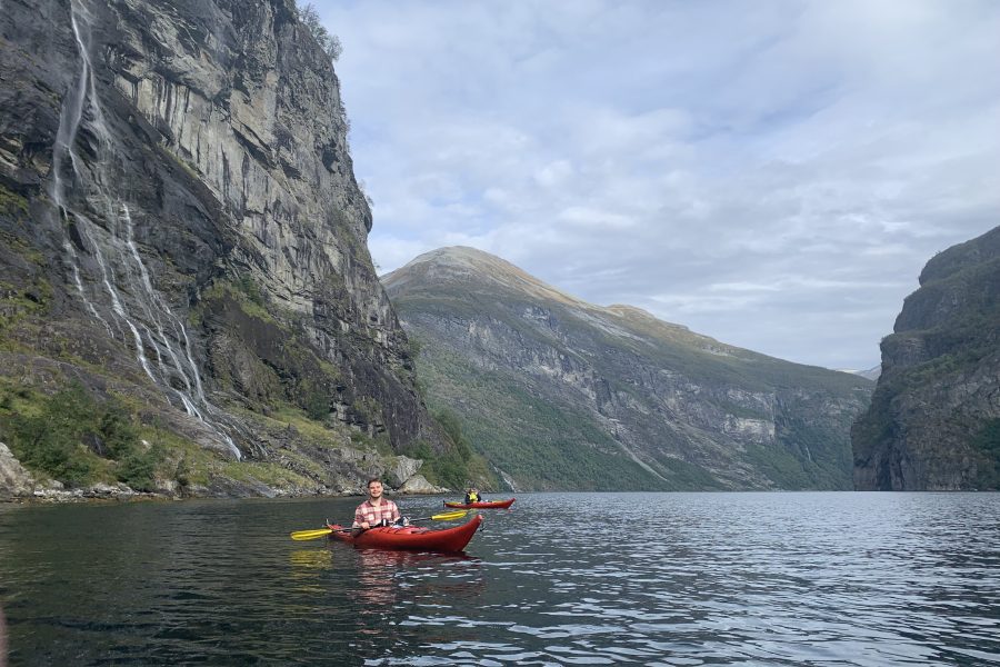 Person kayaks in a mountainous area